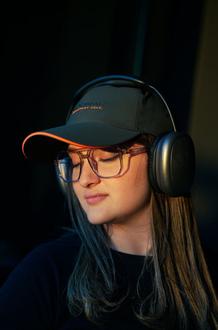 woman wearing headphones in warm evening light