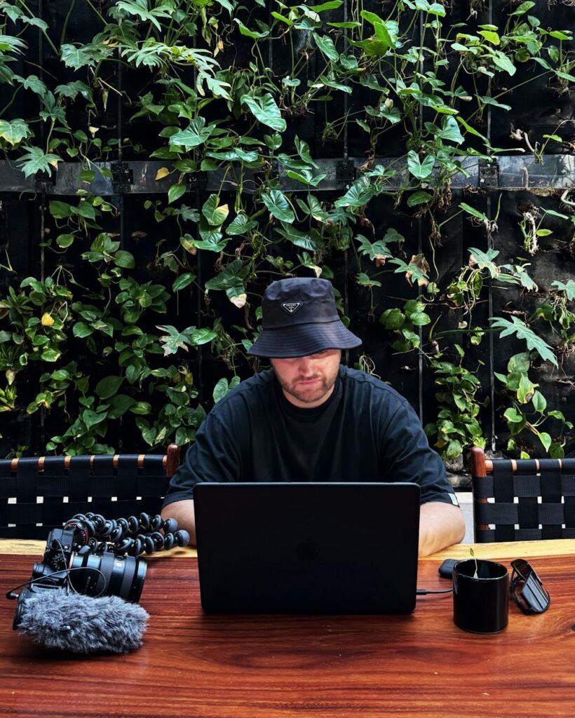 digital nomad working in a mexican outdoor cafe
